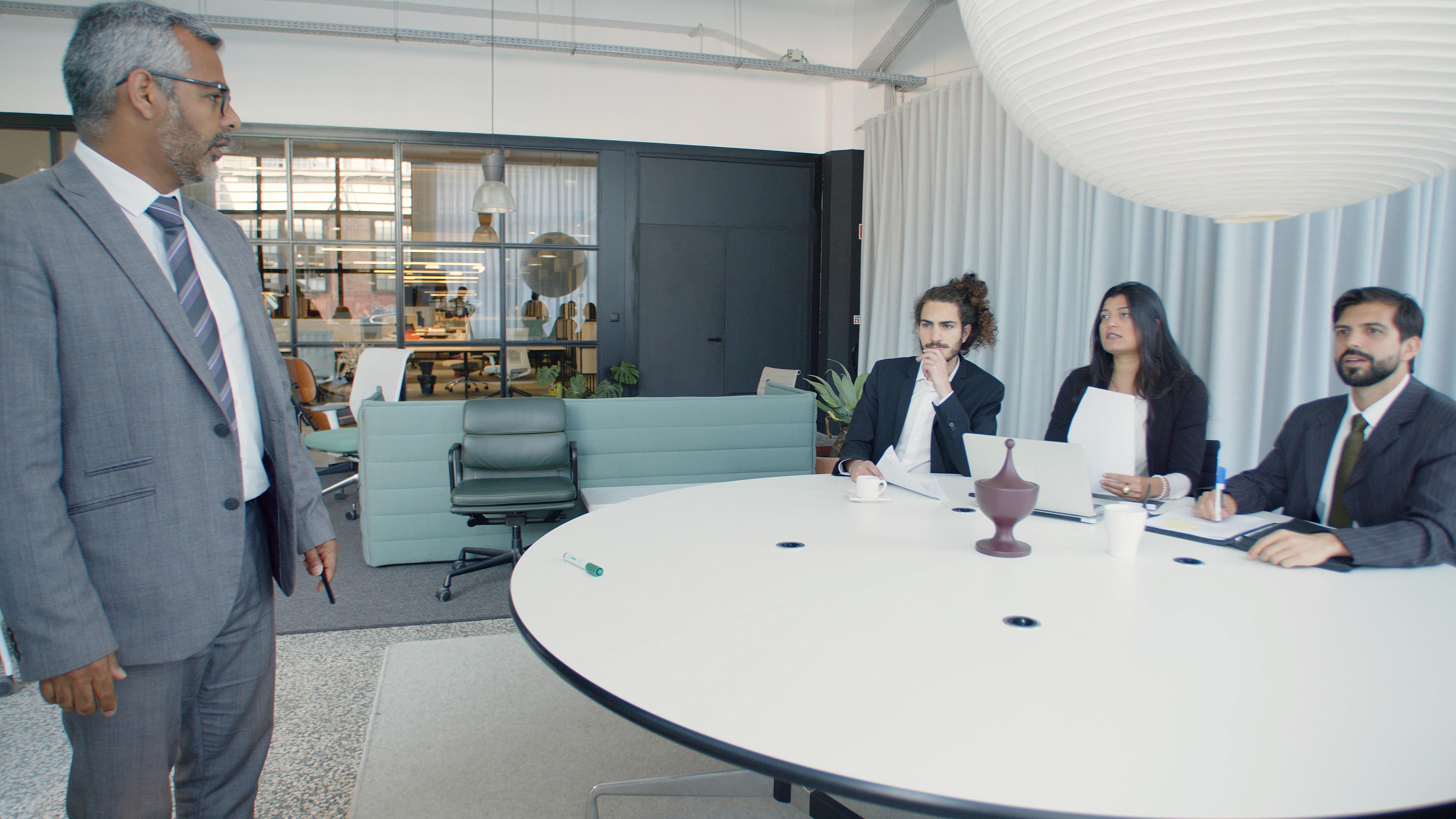 A JEM consultant briefing a client on an executive search